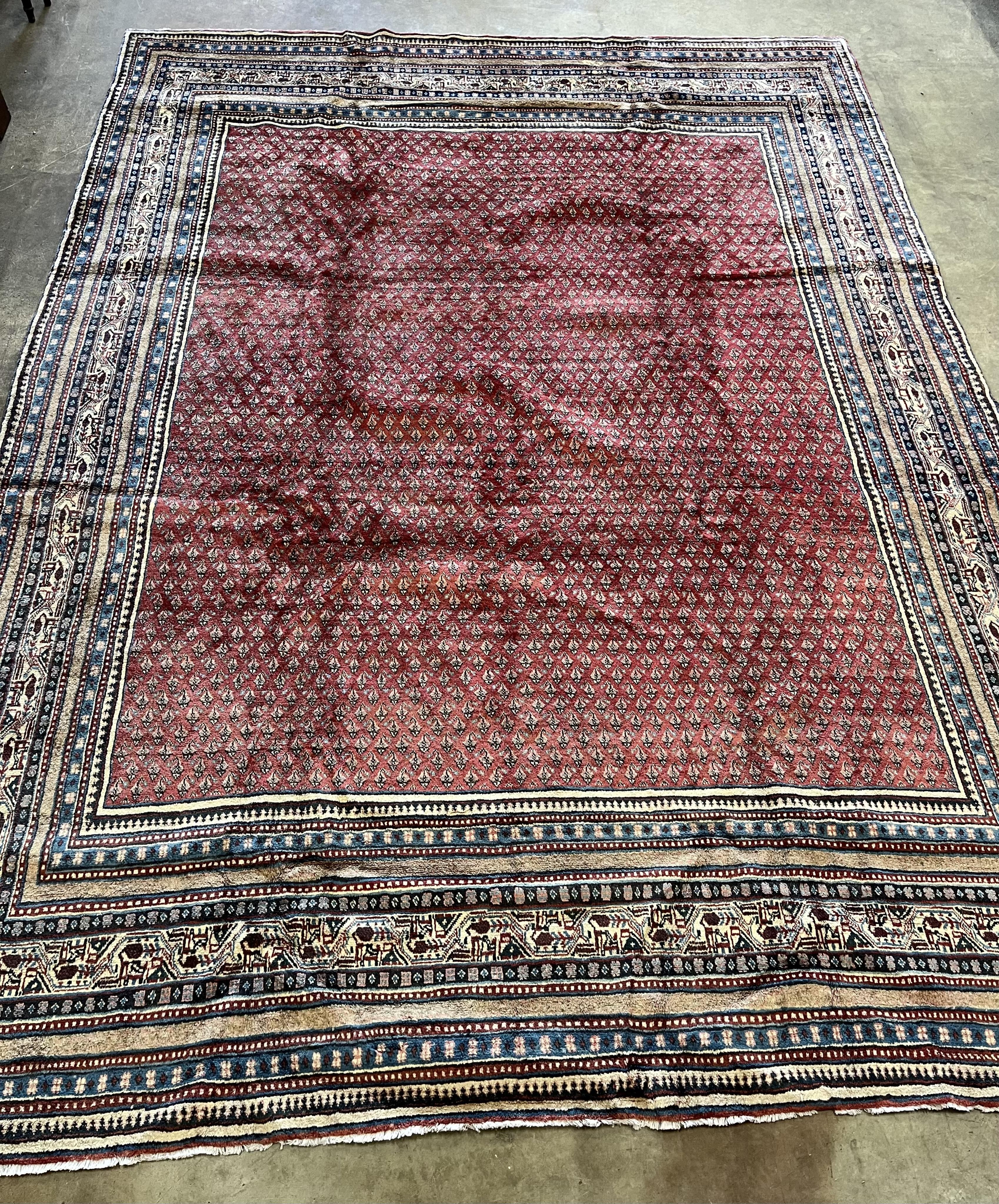 A red ground Araak carpet, 330 x 240